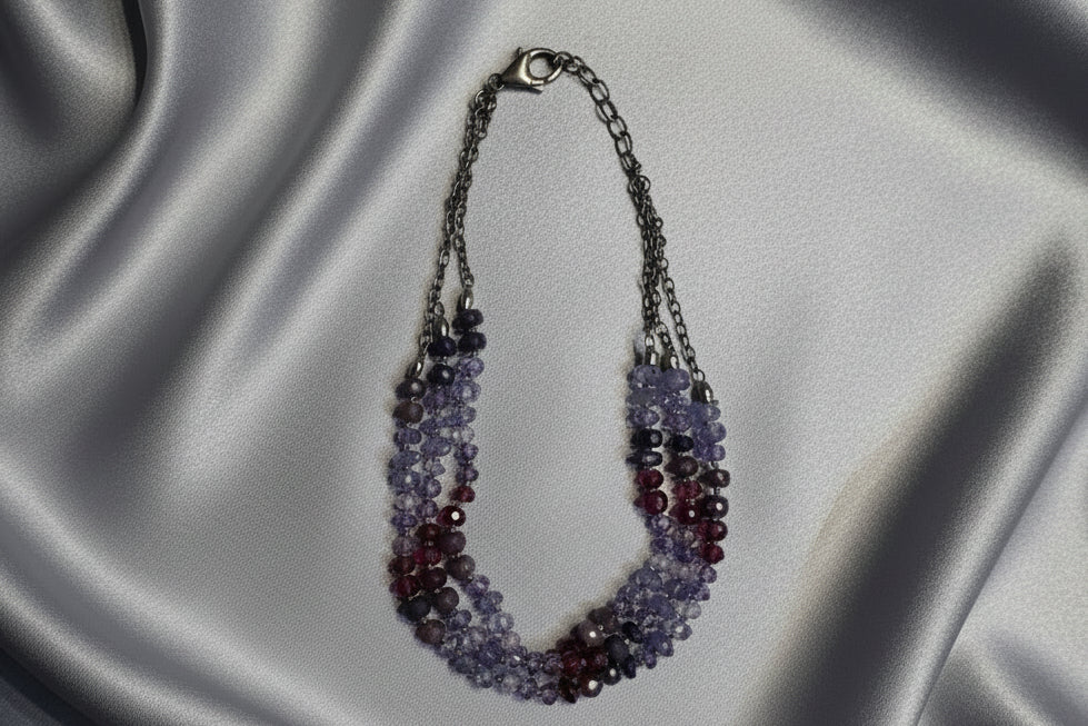 Sterling Plum Mix, Hand knotted Rhodalite, Sapphire, Purple CZ, Tanzanite faceted beaded Bracelet