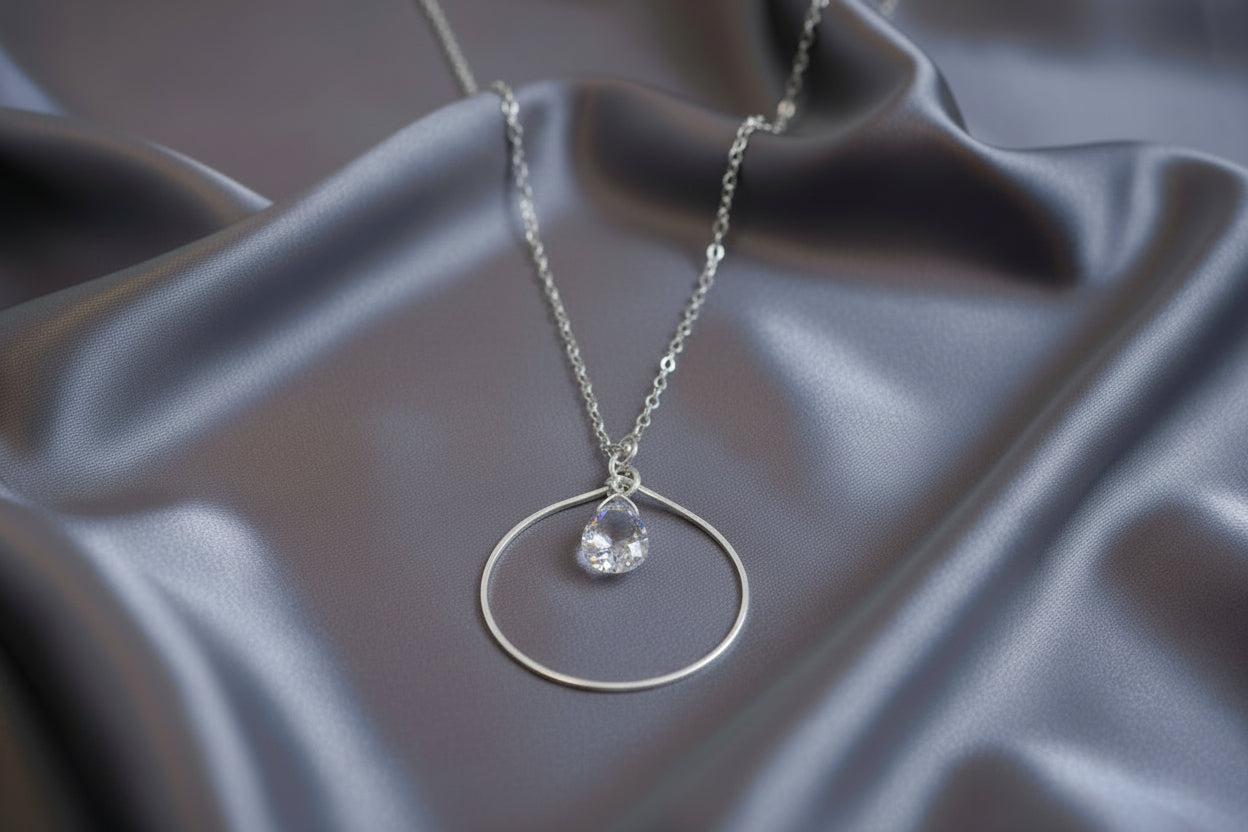 Mia Sterling Silver 18" Chain with Silver Hoop and Topaz Pendant