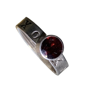 X & O Stamped Sterling Band With Faceted Garnet